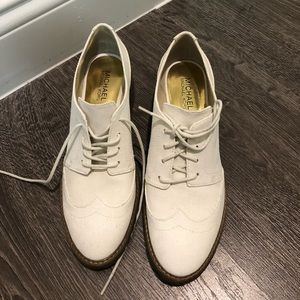 White Michael Kors nubuck shoes.